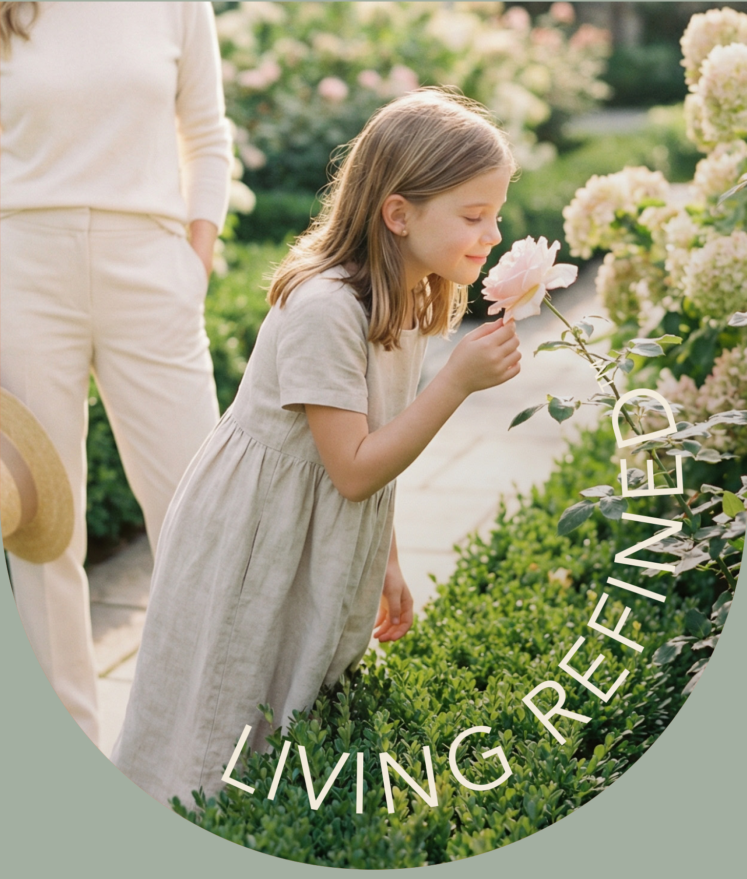 Living Refined – child smelling a flower in a garden